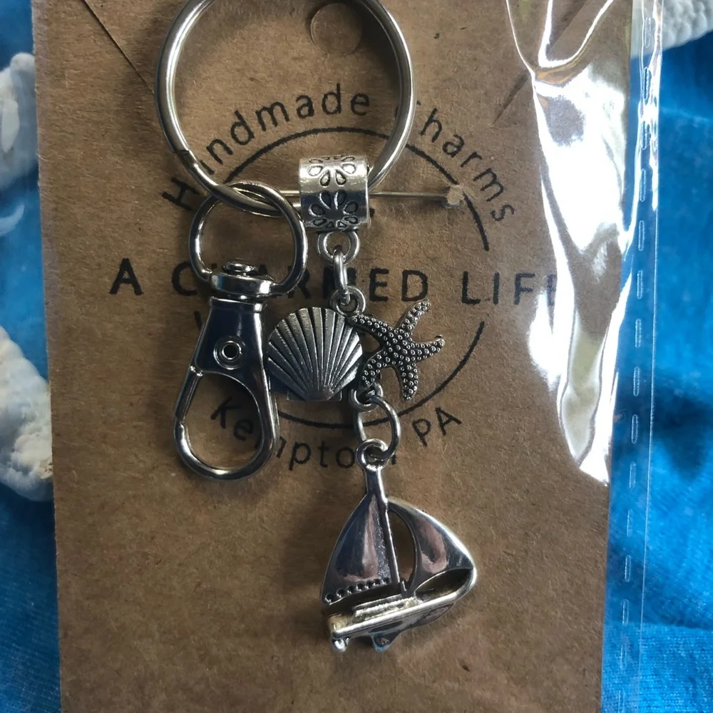 NWT, Handmade by A Charmed Life. Silver Keychain with Nautical Charms